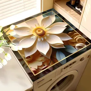 Close-up detail of washing machine top cover pad featuring a 3D floral design in a home scene.