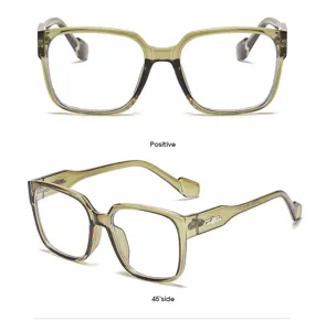 Gafas cuadradas transparentes verdes de moda con patillas elegantes para uso diario y estilo.