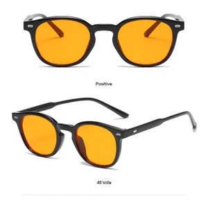 Occhiali da sole rotondi vintage per uomo e donna, montatura nera con lenti arancioni alla moda.