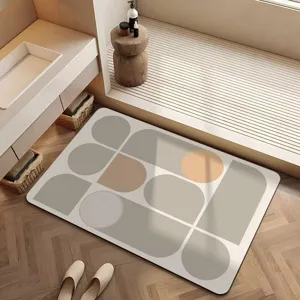 Tapis de bain absorbant en terre de diatomée avec motif géométrique abstrait pour salle de bain.