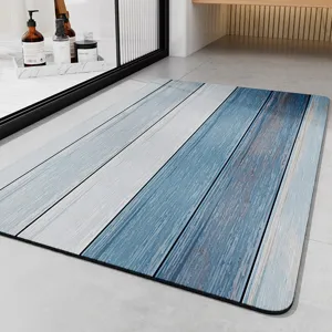 Absorbent bath mat with blue and white wood plank design, non-slip bathroom floor rug for home.
