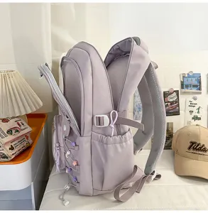Purple school backpack detail view, large capacity student bookbag with transparent ita pocket.