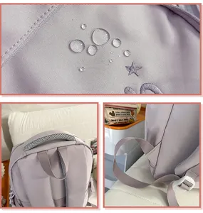 Detailed view of lightweight school backpack with waterproof fabric, embroidery and mesh straps.