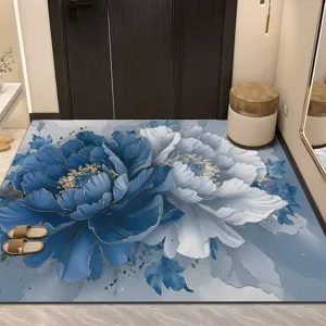 Detailed view of luxury blue floral entry floor mat in hallway home decor scene setting.