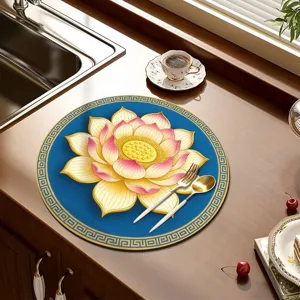 Round diatomite draining mat with lotus design, perfect kitchen absorbent placemat pad.