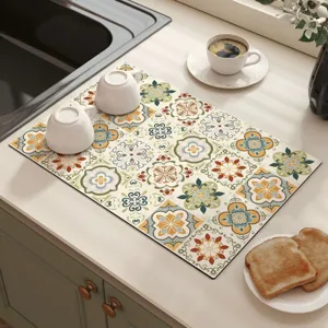 Diatomaceous earth dish drying mat for kitchen counter, absorbent anti-slip placemat.