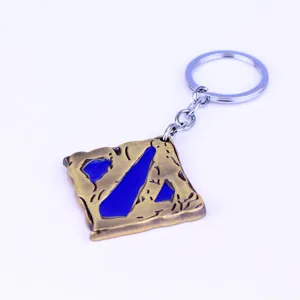 Dota 2 Spiel Logo Metall Schlüsselanhänger Nahaufnahme Detail, Bronze blaue Emaillierung.