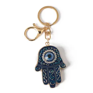 Blue Hamsa Hand keychain with rhinestone Evil Eye and golden lobster clasp detail