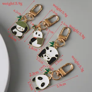 Detailed view of four cute panda enamel keychains with precise size and weight measurements