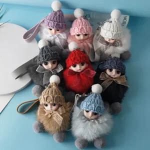 Group of cute plush doll keychains with knitted hats and colorful fur bodies