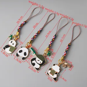Detailed view of panda keychains with precise weight and dimension annotations