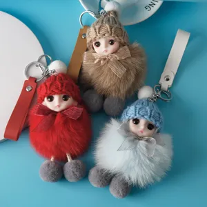 Three cute plush doll keychains with knitted hats and colorful leather straps
