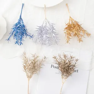 Artificial glitter star grass branches, small plant bundles for home and wedding decor.