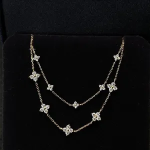 S925 plata pavimentado circonita cúbica trébol de cuatro hojas pulsera doble elegante