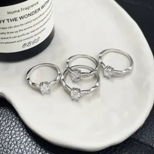 Vista detallada exquisita de anillos torcidos de plata S925 con circón cúbico ovalado.