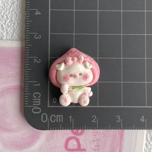 Cute peach pig resin charm cabochon for DIY hair clips, phone cases, and shoe accessories.