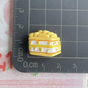 Mini resin cake charm for DIY crafts, hair clips, and cute phone case resin decorations.
