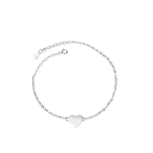 Silver heart anklet detail shot, minimalist design, delicate foot jewelry for women everyday.