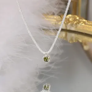 Elegant S925 sterling silver chain necklace featuring an olive green cubic zirconia pendant for women.