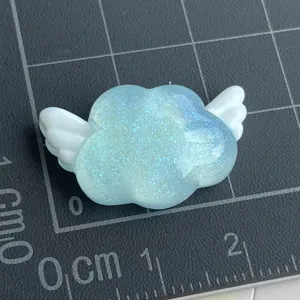 Ciondolo DIY in resina nuvola con ali effetto glitter perlato blu per accessori artigianali