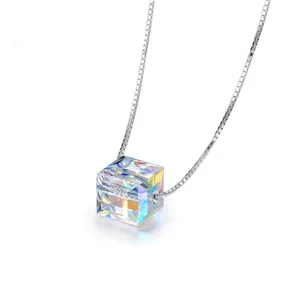 Detailed close-up view of the glittering crystal cube pendant showcasing brilliant light.