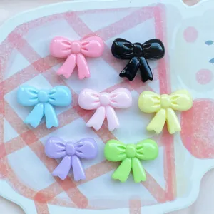 Colorful resin bow charms, small flatback cabochons for DIY crafts, nail art, jewelry.