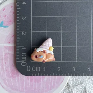 Mini resin capybara ice cream charm detail view, cute DIY decoration for hairpins and shoes.