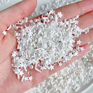 Μεικτά λευκά charms slime χάντρες αστέρια στρας για γεμίσματα εποξειδικής ρητίνης.