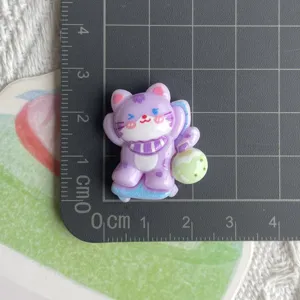 Cute purple cat resin charm detail view, perfect for DIY phone cases, hair clips and accessories.