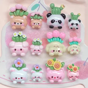 Detail view of cute cartoon potted animal resin charms for DIY phone case and hair clip accessories