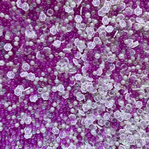 Mixed DIY cat paw beads, pearls, and crystal rhinestones for slime making and handmade jewelry.