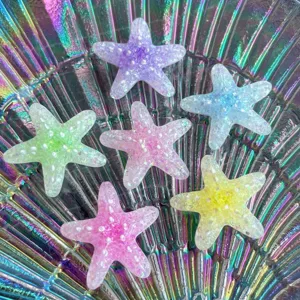 Jolis accessoires DIY en resine en forme d etoiles de mer pailletees pour pinces a cheveux.