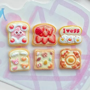 Cute cartoon toast resin charms with strawberry and egg, perfect for DIY craft and shoe charms.