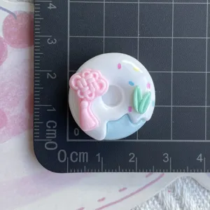 Resin Chinese style donut charm close-up, perfect for DIY phone case hair clip crafting.