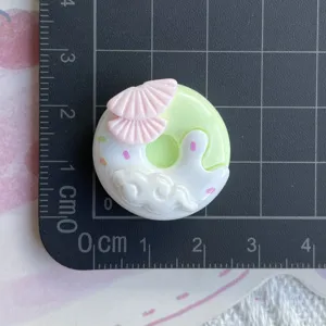 Ancient style donut resin charm detail, perfect for DIY hair clips and phone case accessories.