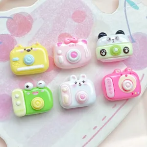 Cute animal camera resin charms detail showing various cute designs like frogs and rabbits.