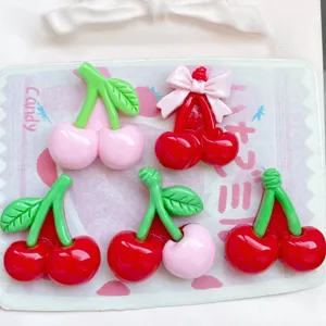 Large resin cherry charms in red and pink for DIY phone cases, keychains, and jewelry.