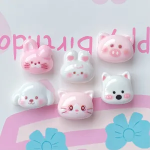 Mini resin cartoon animal head cabochons for handmade nail art, hair clips, and jewelry DIY.