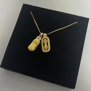 New Chinese style gold-toned Pi Xiu and Dorje double pendant necklace, delicate and elegant.