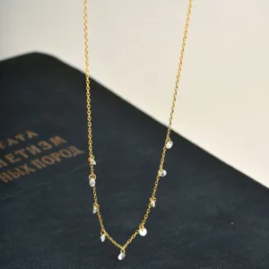 Gold-colored sterling silver star zircon necklace, delicate clavicle chain for daily wear.