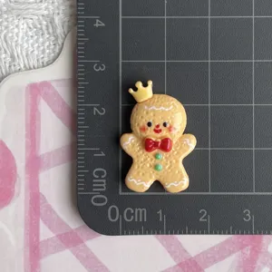 Resin gingerbread man charm with crown, cute cartoon flatback cabochon for DIY hair clip.