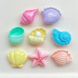 Colorful resin seashell and starfish charms, perfect for DIY phone cases and hair clips.