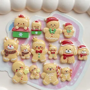 Detail shot of cute Christmas gingerbread man and animal resin charms for DIY hair clips.