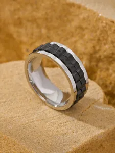 Detailed view of men's stainless steel rotatable watch chain ring in punk style
