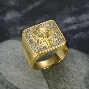 Detailed macro view of a gold-plated stainless steel lion head ring with rhinestones