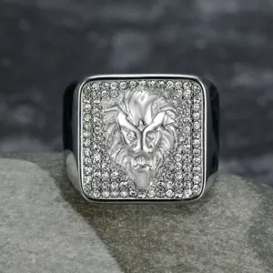 Close-up of men's silver-tone stainless steel ring with lion head and clear rhinestones