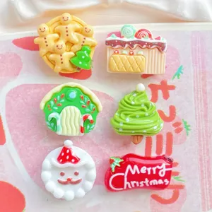 Christmas resin flatback charms detail view, cute gingerbread man and tree DIY accessories.