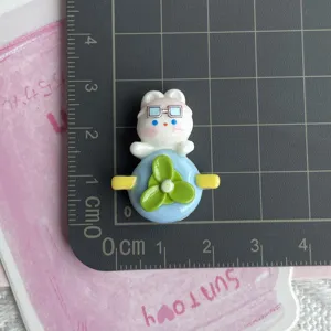Resin little rabbit flatback charm detail shot showing cute cartoon design and exact size scale.