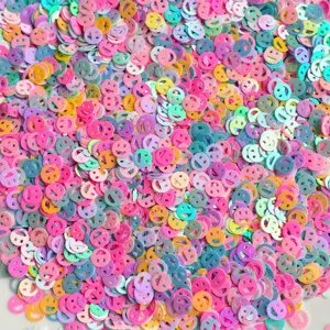 Paillettes sorridenti colorate per fai da te, creazione gioielli in resina e nail art design.
