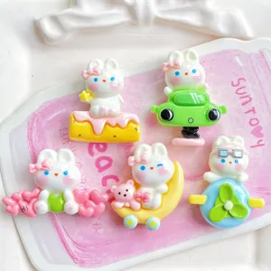 Cute resin rabbit cabochons detail shot, perfect for DIY phone cases and hair clips.